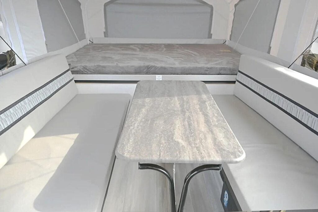 Interior of the Coachmen Clipper LS 806XLS Pop-up, Highlighting its Spacious Dinette Area