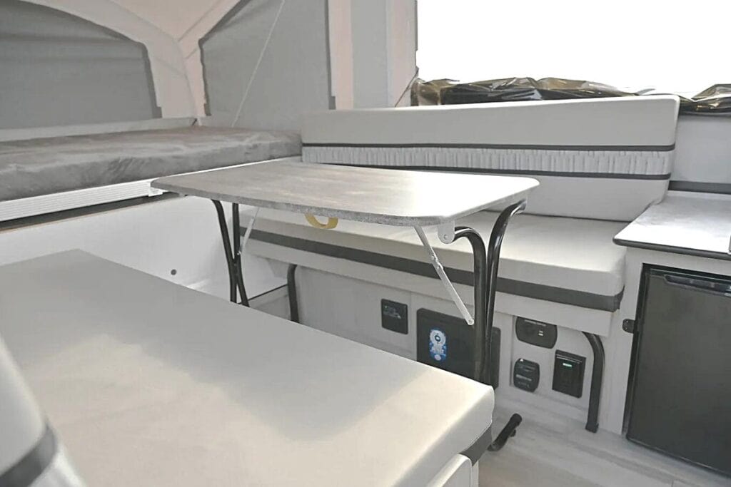 Interior of the Coachmen Clipper LS 806XLS Highlighting the Dinette Area and Gaucho Couches